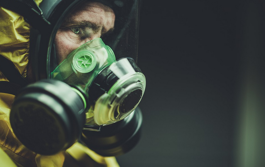 masked pest exterminator